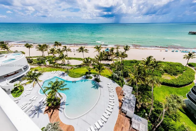 a view of a lake with a yard