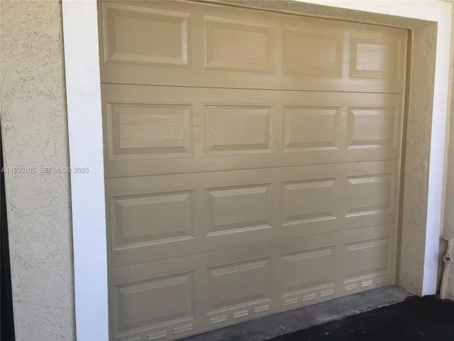 a view of empty room with stairs