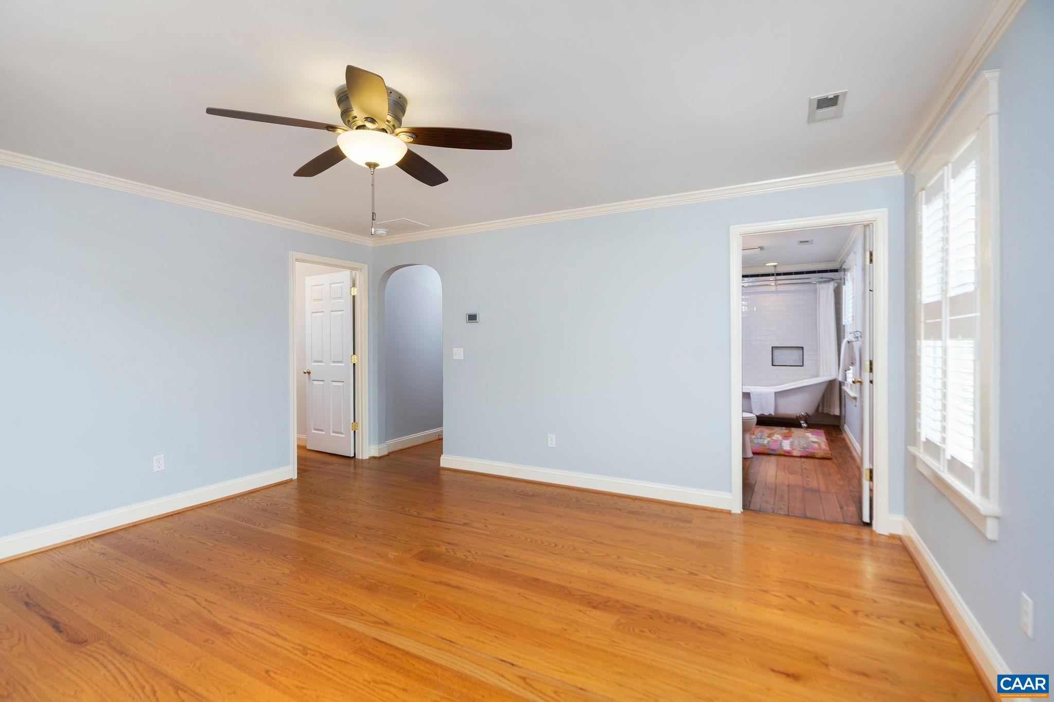 417 9th Street Northwest Charlottesville, VA 22903 - Photo 16 of 33 a view of an empty room with a window