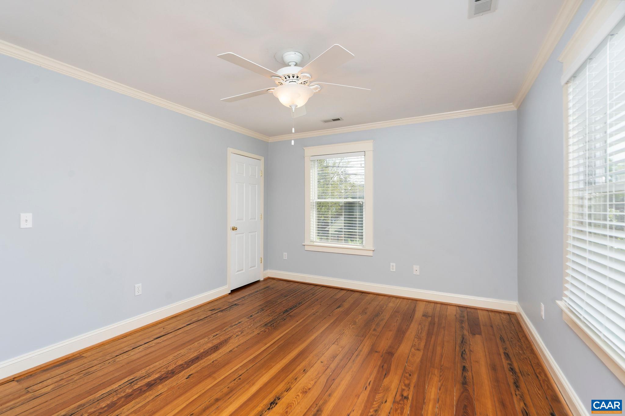 417 9th Street Northwest Charlottesville, VA 22903 - Photo 25 of 33 wooden floor in an empty room with a window