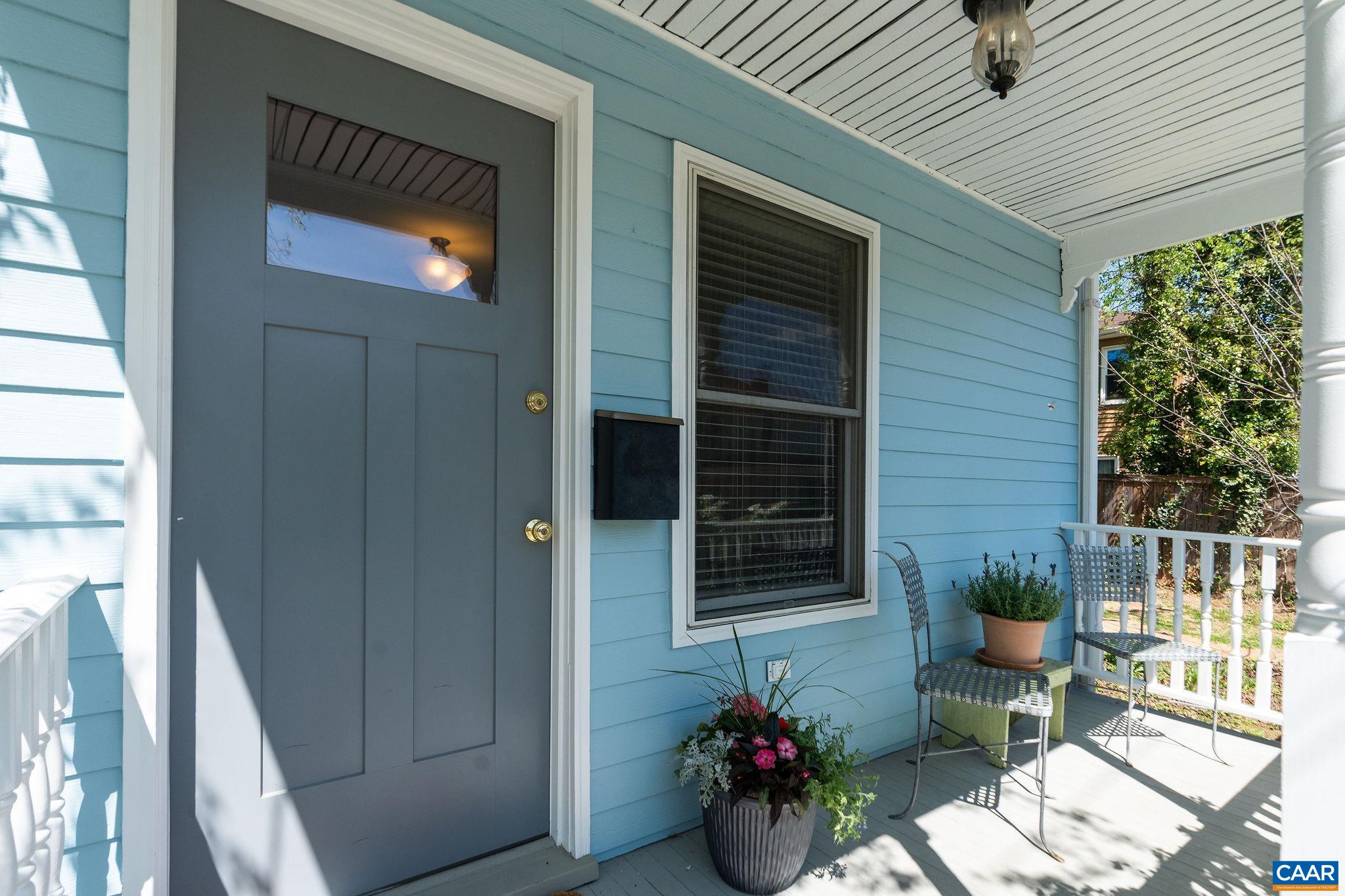 417 9th Street Northwest Charlottesville, VA 22903 - Photo 32 of 33 a view of a porch with chairs and potted plants