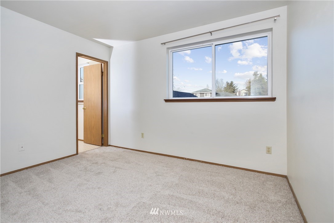 1216 223rd Street Southwest Bothell, WA 98021 - Photo 14 of 22 an empty room with a window