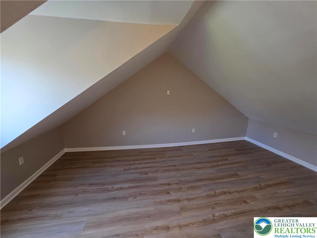122 East Goepp Street, Unit 3 Bethlehem, PA 18018 - Photo 5 of 12 a view of an empty room with wooden floor