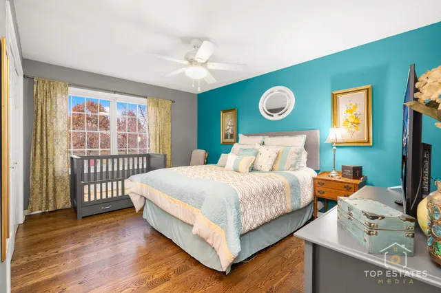 a bedroom with bed and window