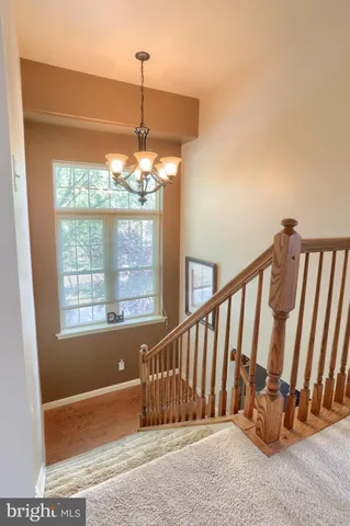 a view of stairs and a floor to ceiling window