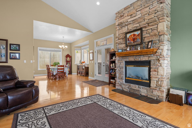 708 Eagle Rdg Drive Bountiful, UT 84010 - Photo 7 of 69 Floor-to-ceiling stone fireplace with an integrated firebox and wood mantel