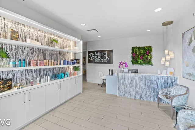 an aerial view of a house a yard and outdoor seating