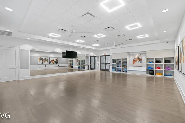 a view of swimming pool with outdoor seating