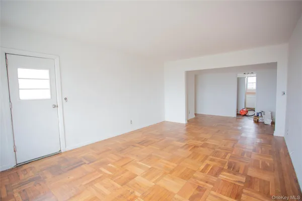 a view of an empty room and window