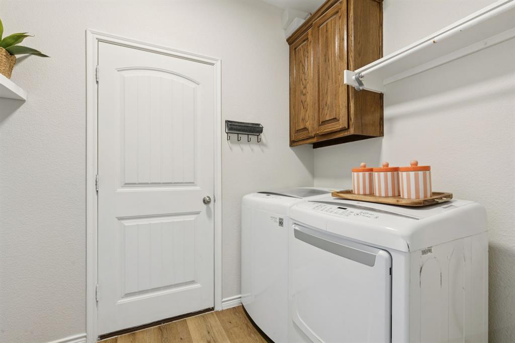 1326 White Water Lane Rockwall, TX 75087 - Photo 25 of 34 a utility room with dryer and washer