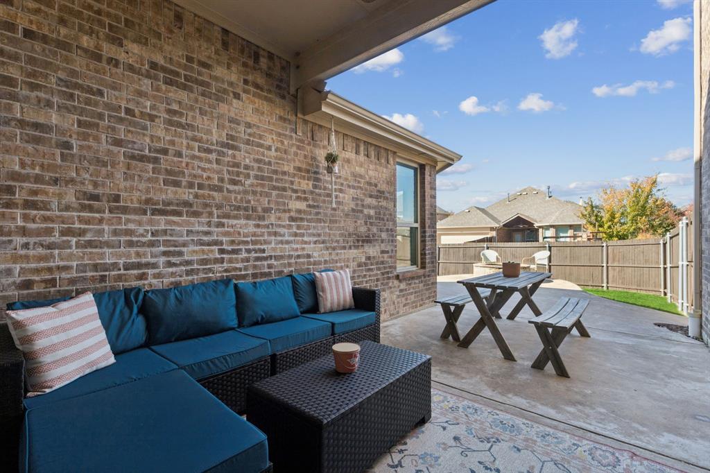 1326 White Water Lane Rockwall, TX 75087 - Photo 26 of 34 a outdoor living space with furniture