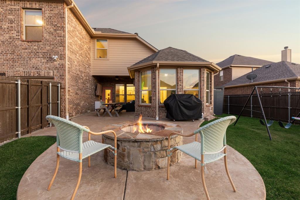 1326 White Water Lane Rockwall, TX 75087 - Photo 28 of 34 a view of a house with backyard and sitting area