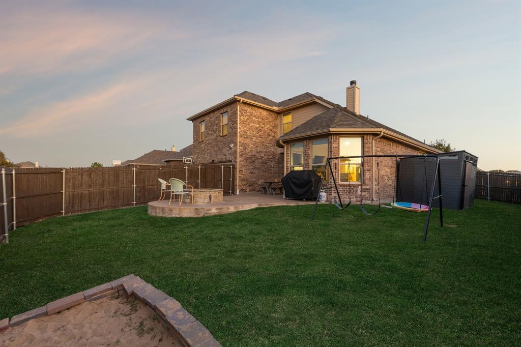 1326 White Water Lane Rockwall, TX 75087 - Photo 29 of 34 a view of a house with backyard