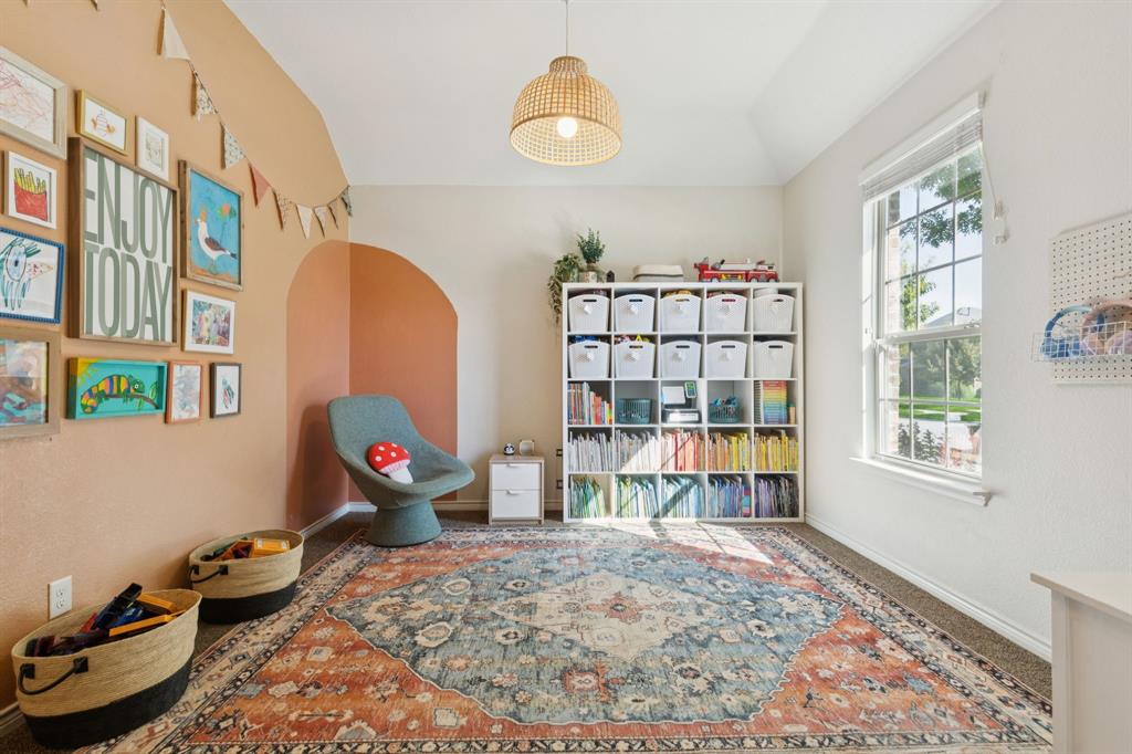 1326 White Water Lane Rockwall, TX 75087 - Photo 3 of 34 a living room with furniture and a window