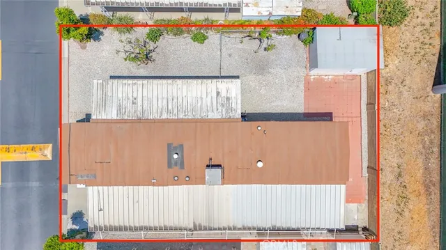 view of a bathroom with a painting on the wall