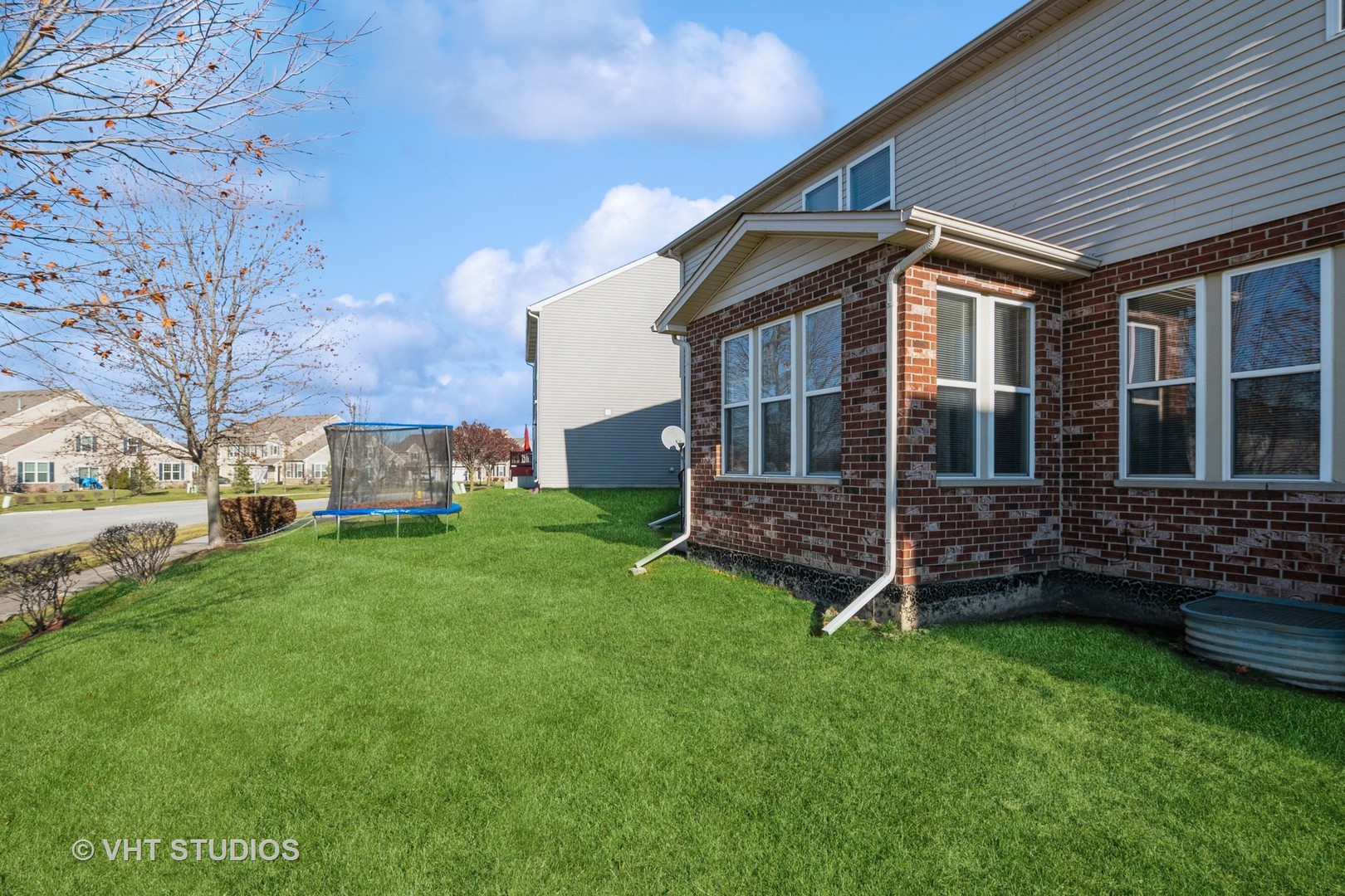 82 Stephens Matteson, IL 60443 - Photo 32 of 33 a view of a house with a yard and sitting area