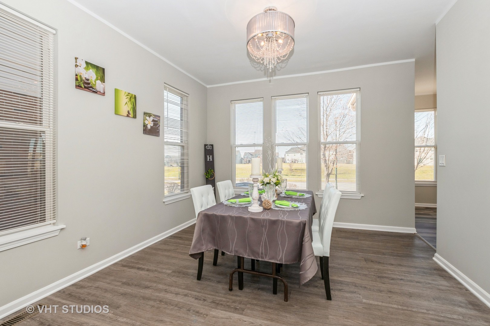 82 Stephens Matteson, IL 60443 - Photo 6 of 33 a view of a dining room with furniture window and wooden floor