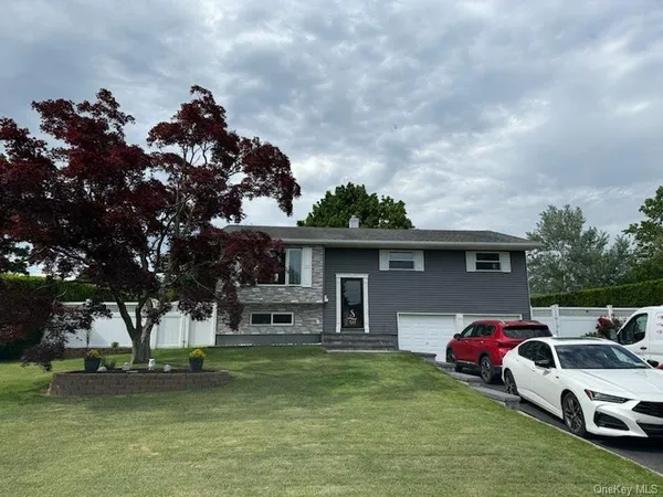$690,000 | 129 Sherman Street, Brentwood, NY 11717