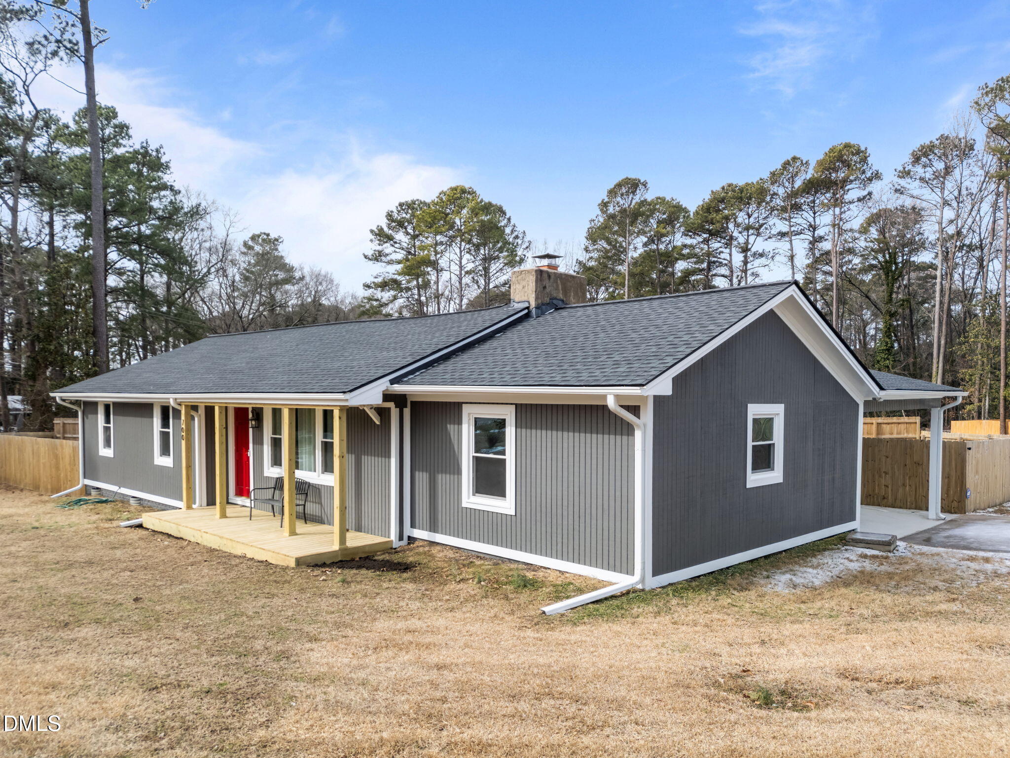 700 Woodland Road Raleigh, NC 27603 - Photo 1 of 35 a view of a house with a backyard