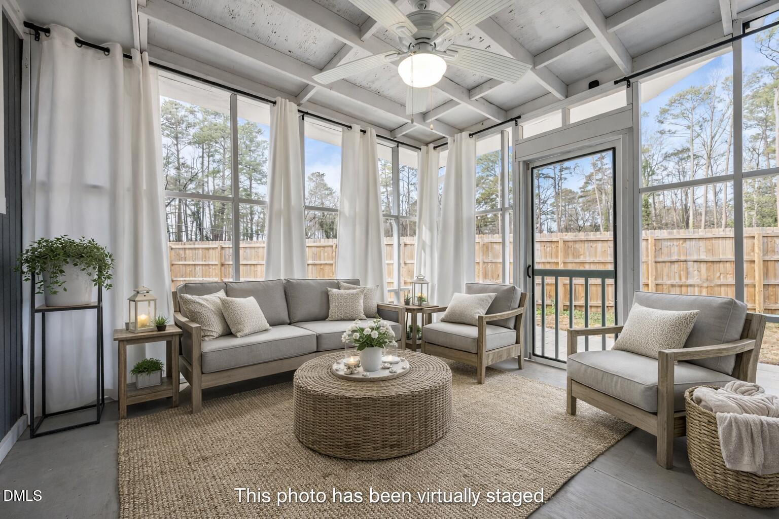 700 Woodland Road Raleigh, NC 27603 - Photo 18 of 35 a living room with furniture and a large window