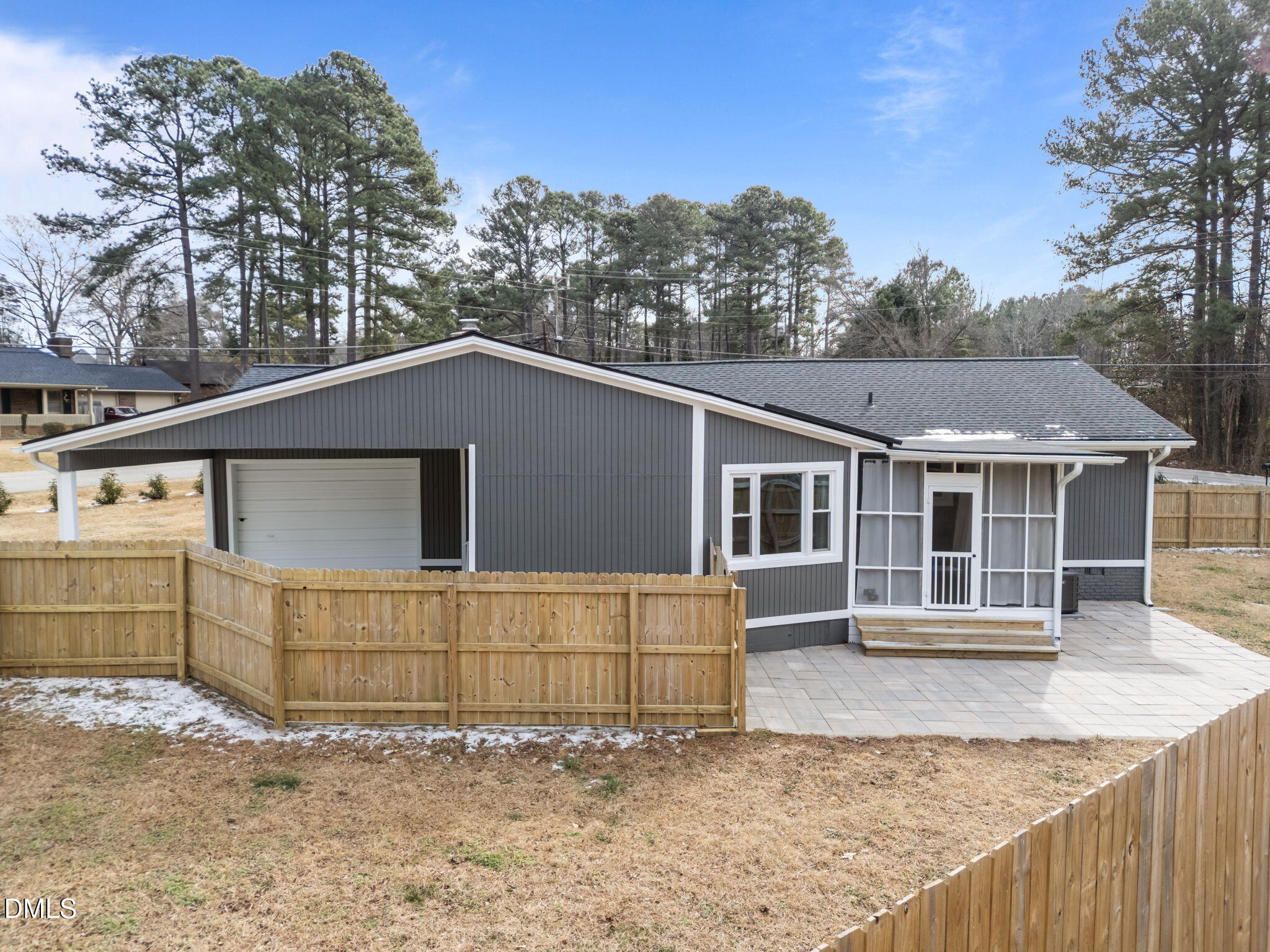 700 Woodland Road Raleigh, NC 27603 - Photo 23 of 35 a view of a house with a backyard