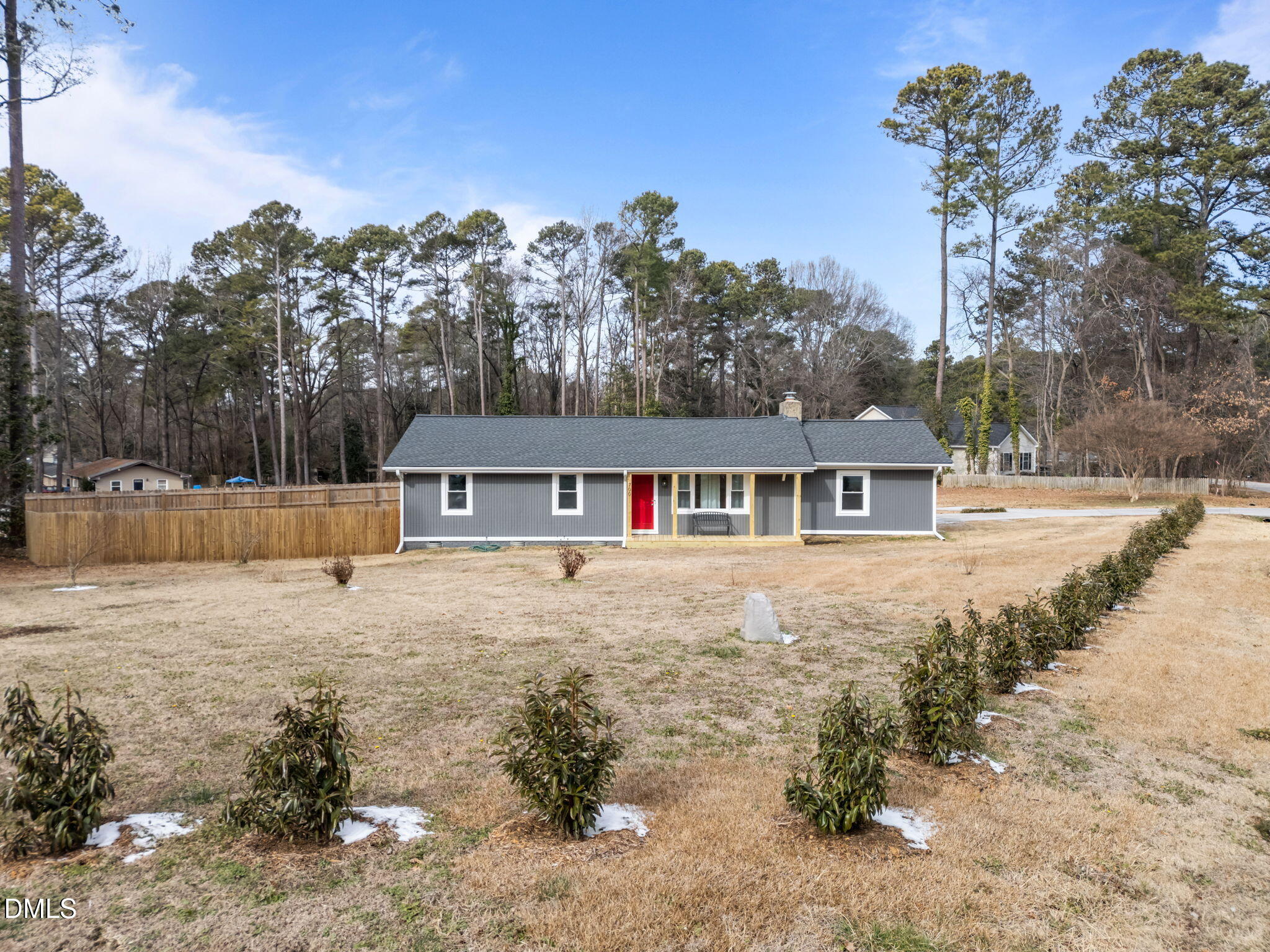 700 Woodland Road Raleigh, NC 27603 - Photo 24 of 35 a view of a house with a yard