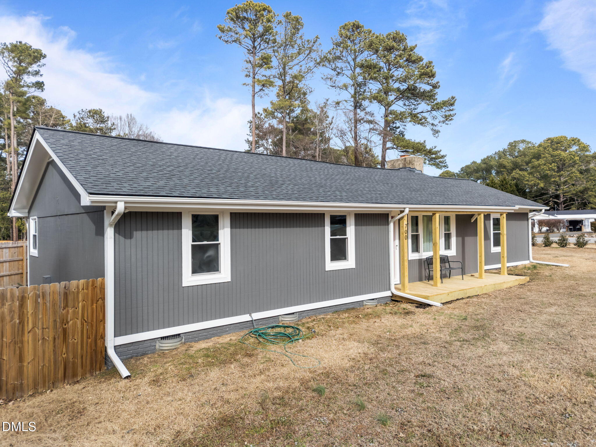 700 Woodland Road Raleigh, NC 27603 - Photo 25 of 35 a front view of a house with a yard and garage
