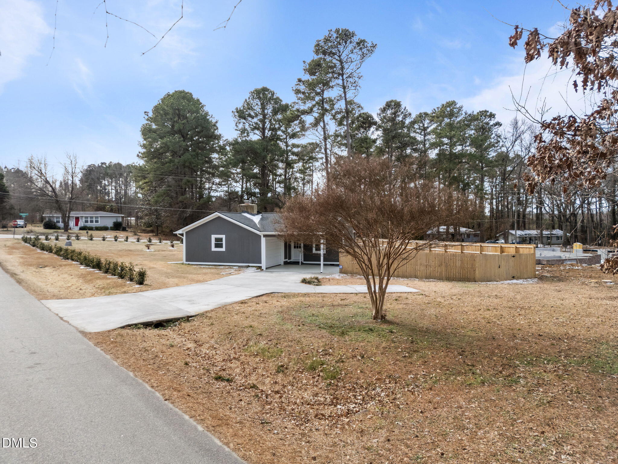 700 Woodland Road Raleigh, NC 27603 - Photo 27 of 35 a view of a house with a snow yard