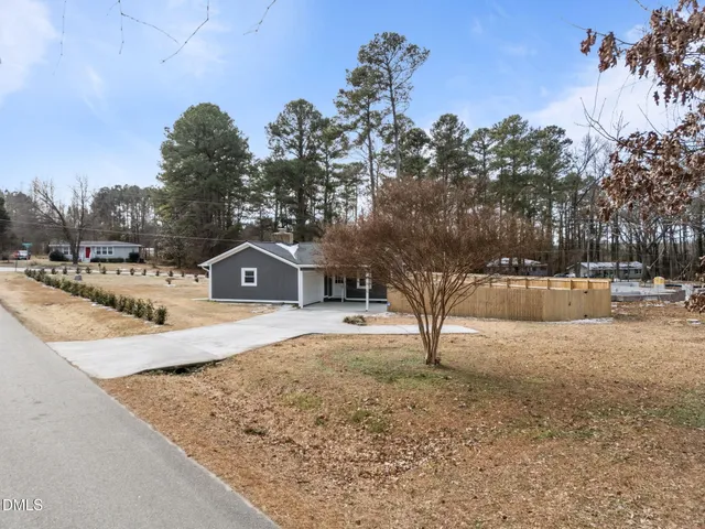 a view of a house with a snow yard