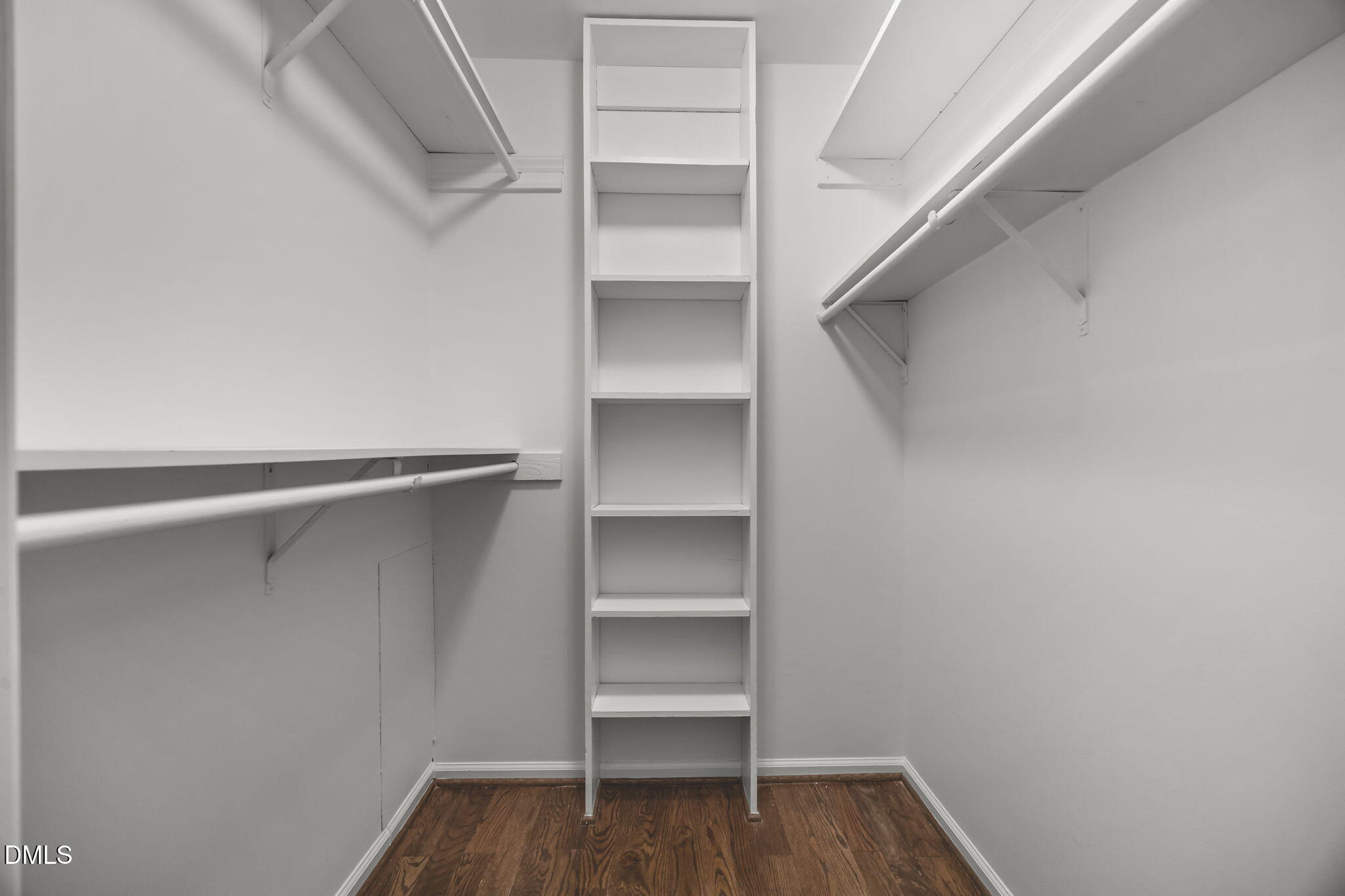 700 Woodland Road Raleigh, NC 27603 - Photo 33 of 35 a view of walk in closet with empty racks