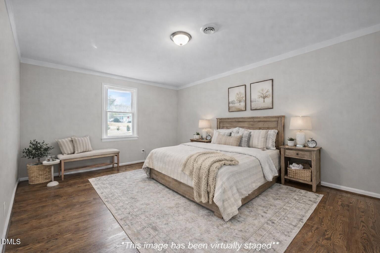 700 Woodland Road Raleigh, NC 27603 - Photo 5 of 35 a bedroom with a bed and a couch