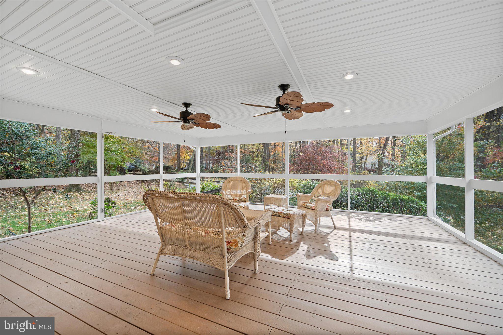 915 Welham Green Road Great Falls, VA 22066 - Photo 19 of 59 Spacious sunroom, garden views from 3 sides