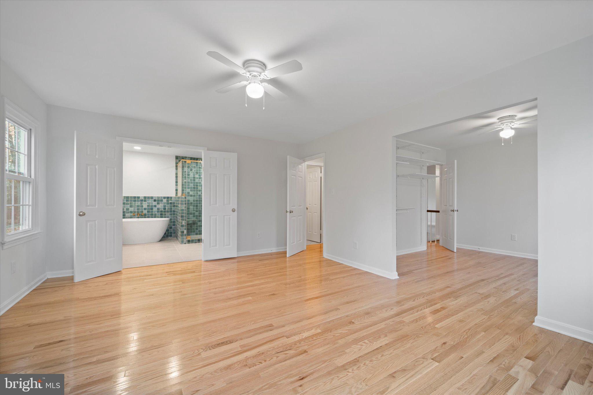 915 Welham Green Road Great Falls, VA 22066 - Photo 23 of 59 Owner's suite bedroom showing ensuite bathroom