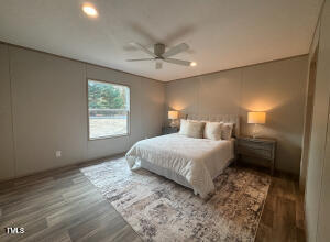 4285 Autry Mill Road Godwin, NC 28344 - Photo 10 of 19 a bedroom with a bed and a window