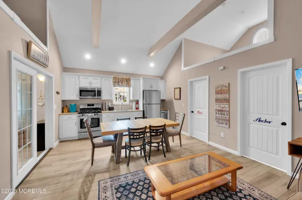 a view of a dining room with furniture