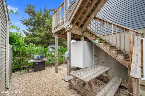 a room with table tennis pool table and windows