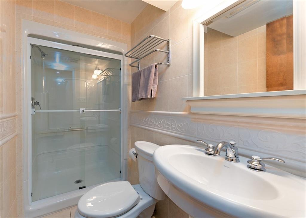 1267 Fall Lane Irwin, PA 15642 - Photo 22 of 22 a bathroom with a sink toilet and shower