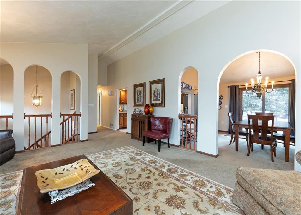 1267 Fall Lane Irwin, PA 15642 - Photo 7 of 22 a living room with furniture and a fireplace