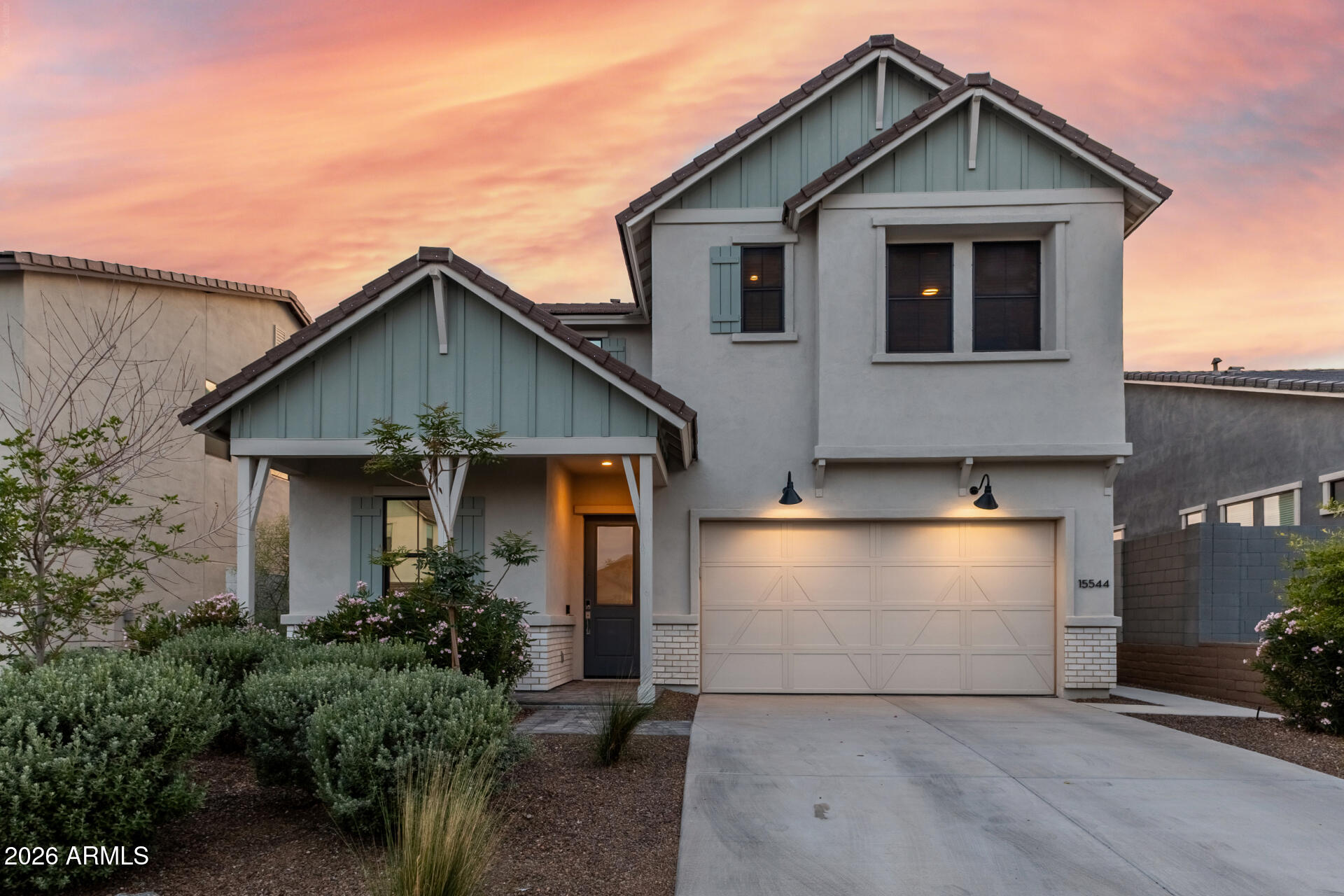 15544 South 181st Lane Goodyear, AZ 85338 - Photo 2 of 46 a front view of house with yard and trees in the background