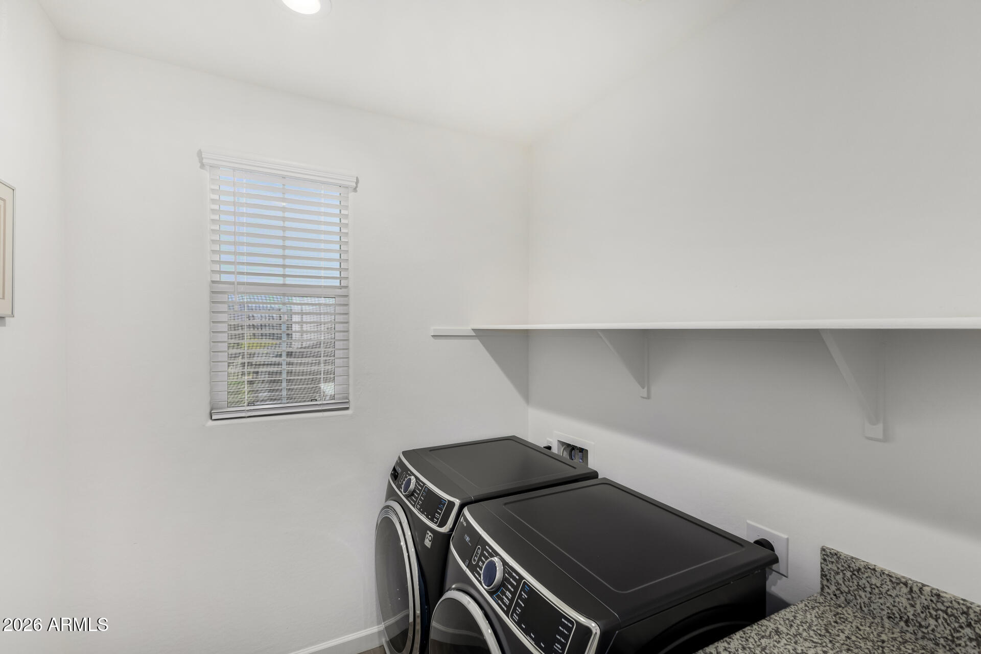 15544 South 181st Lane Goodyear, AZ 85338 - Photo 26 of 46 a room with storage and utility