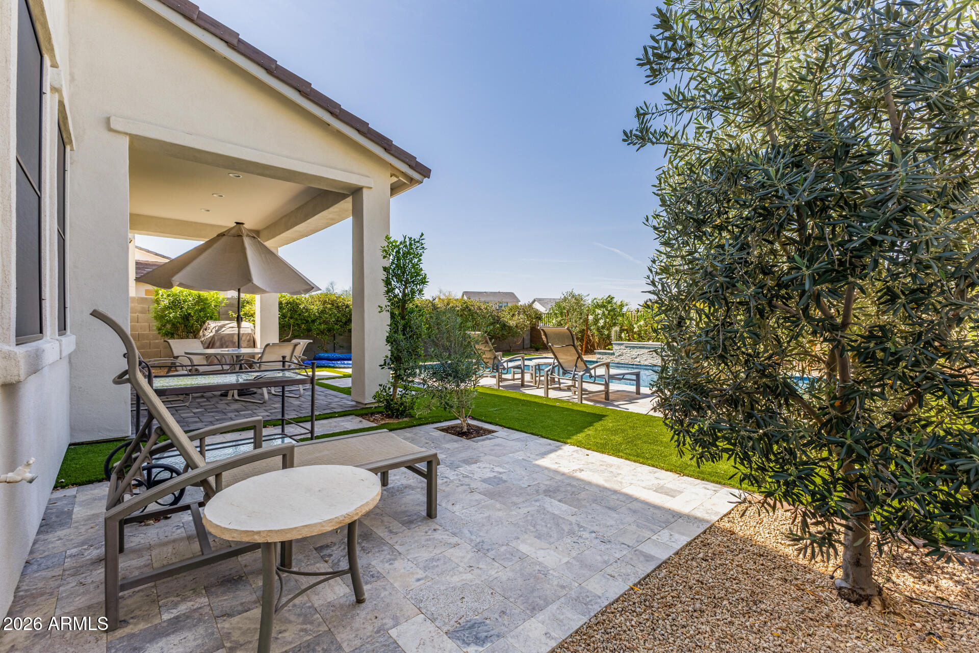 15544 South 181st Lane Goodyear, AZ 85338 - Photo 37 of 46 a view of a chairs and table in the patio