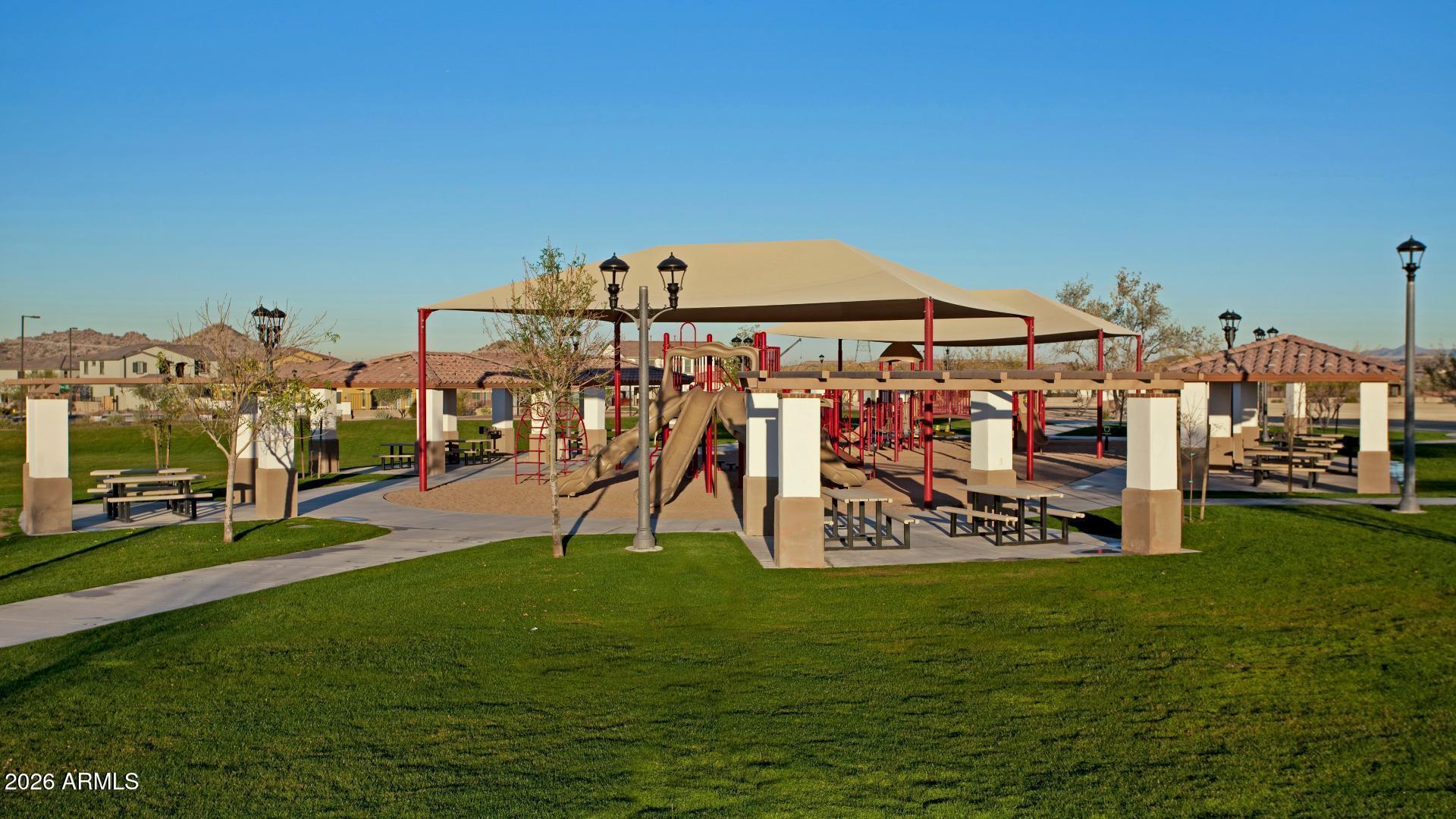 15544 South 181st Lane Goodyear, AZ 85338 - Photo 44 of 46 a view of a park with swings
