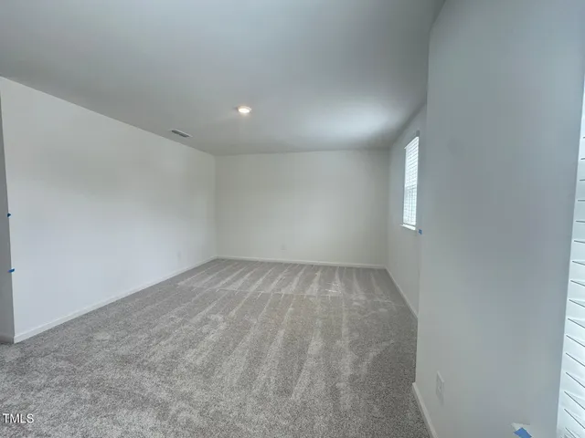 a bathroom with a toilet a sink and view