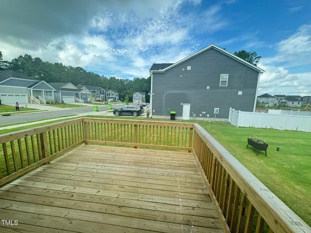 a bathroom with a sink toilet tub and shower