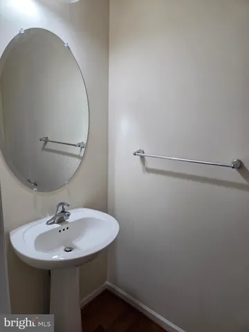 a sink with a mirror