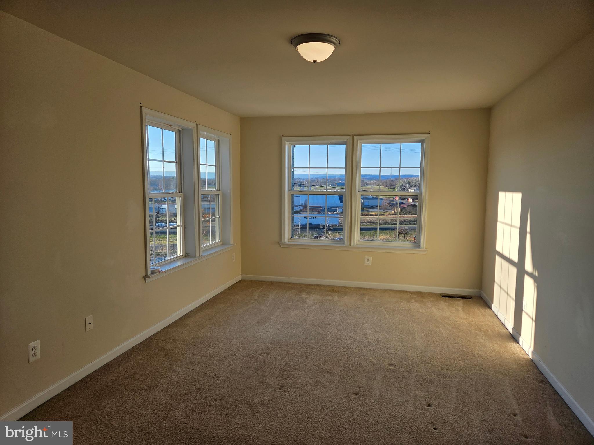 129 Schramm Loop Stephens City, VA 22655 - Photo 12 of 20 an empty room with windows