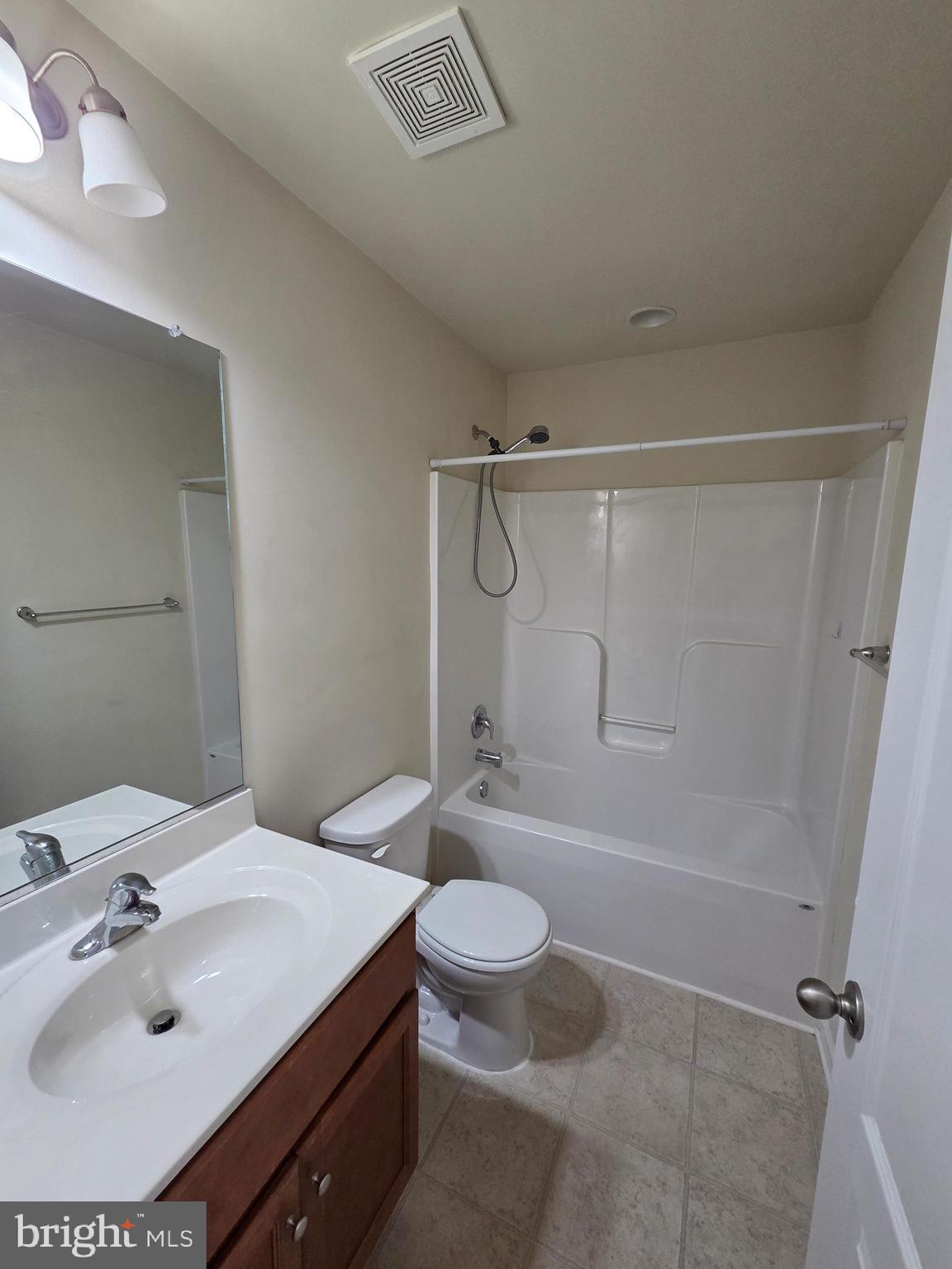 129 Schramm Loop Stephens City, VA 22655 - Photo 16 of 20 a bathroom with a sink toilet and shower