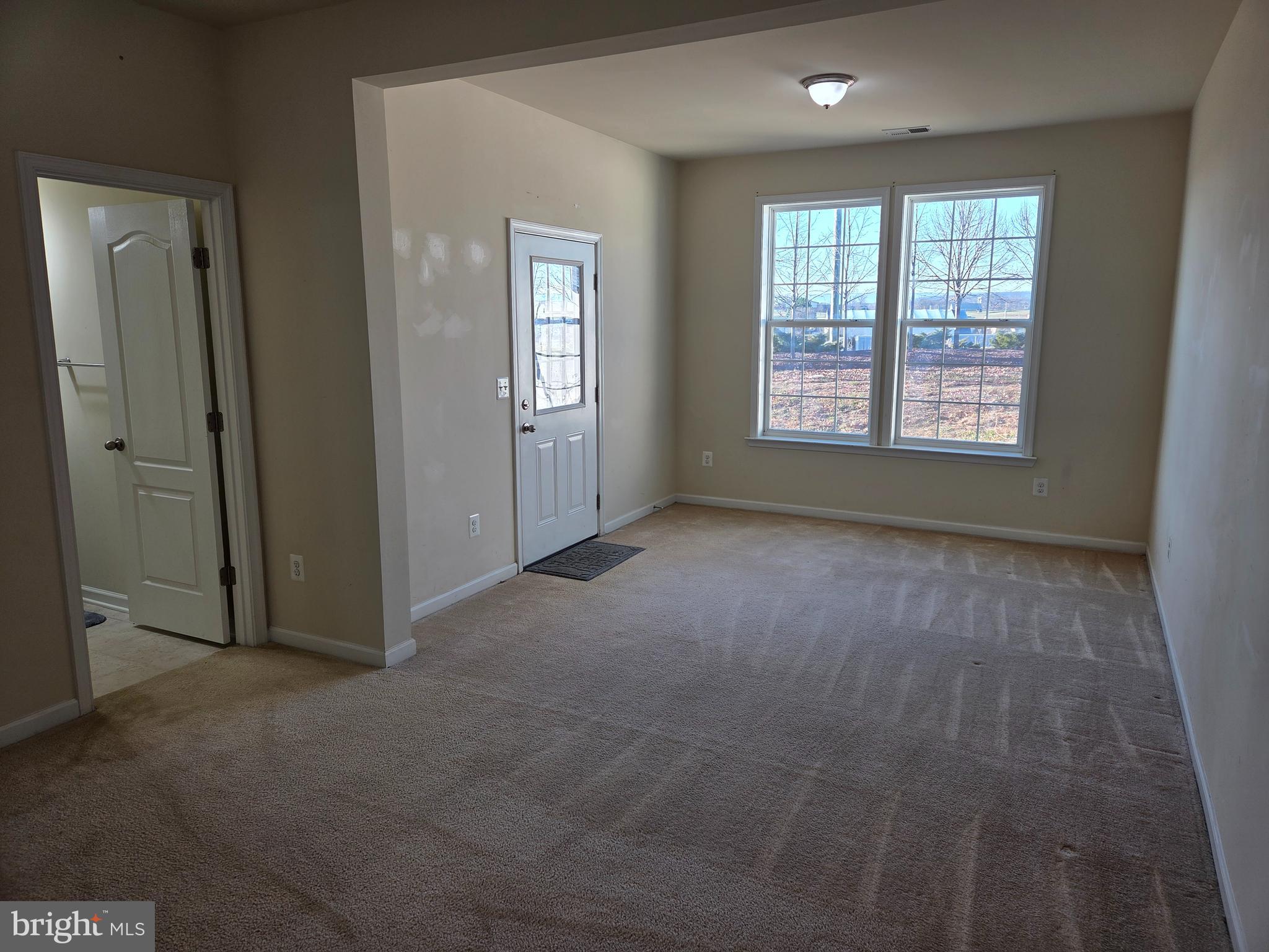 129 Schramm Loop Stephens City, VA 22655 - Photo 2 of 20 a view of an empty room with a window