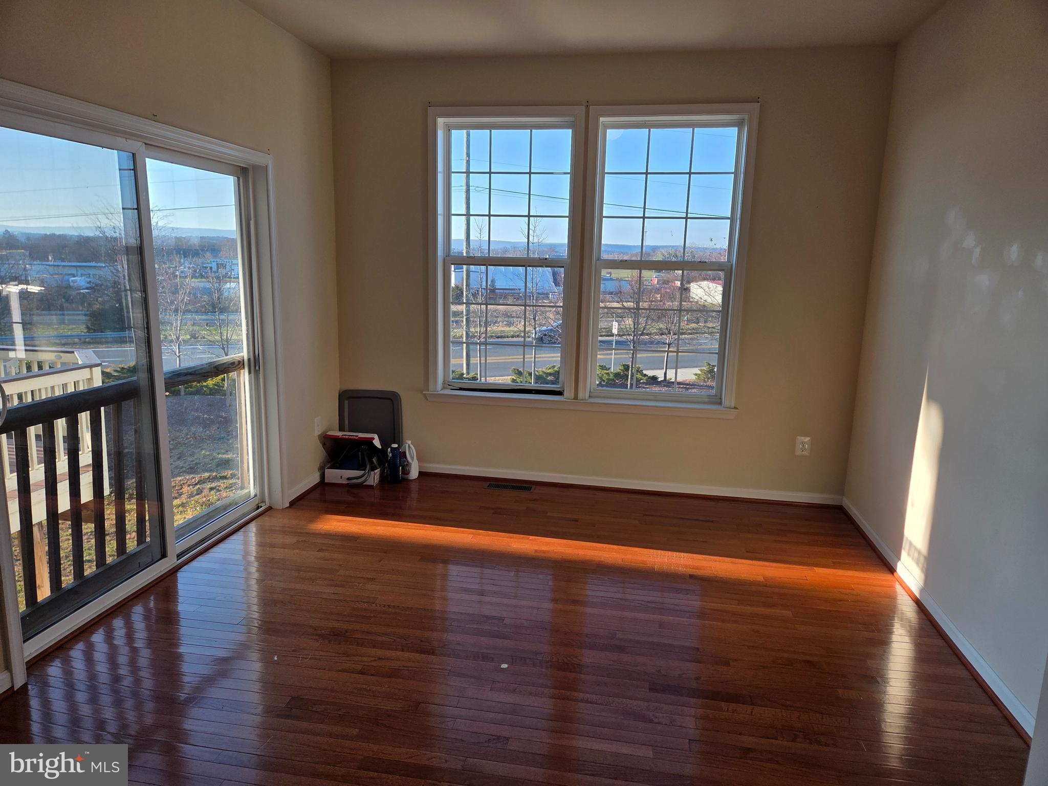129 Schramm Loop Stephens City, VA 22655 - Photo 6 of 20 a view of a room with wooden floor and a window