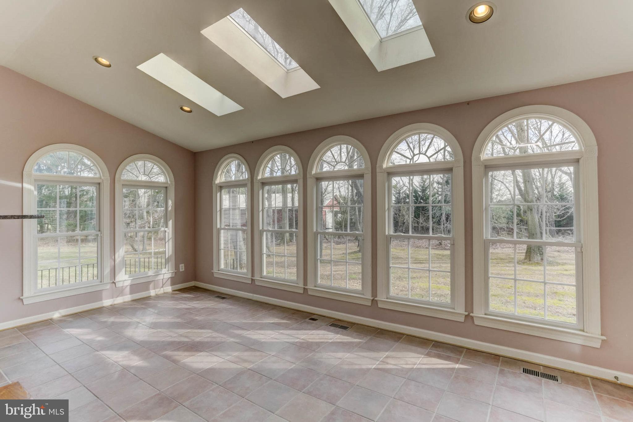 2014 Drovers Lane Cooksville, MD 21723 - Photo 14 of 55 Glorious, window lined Sunroom w/ skylights